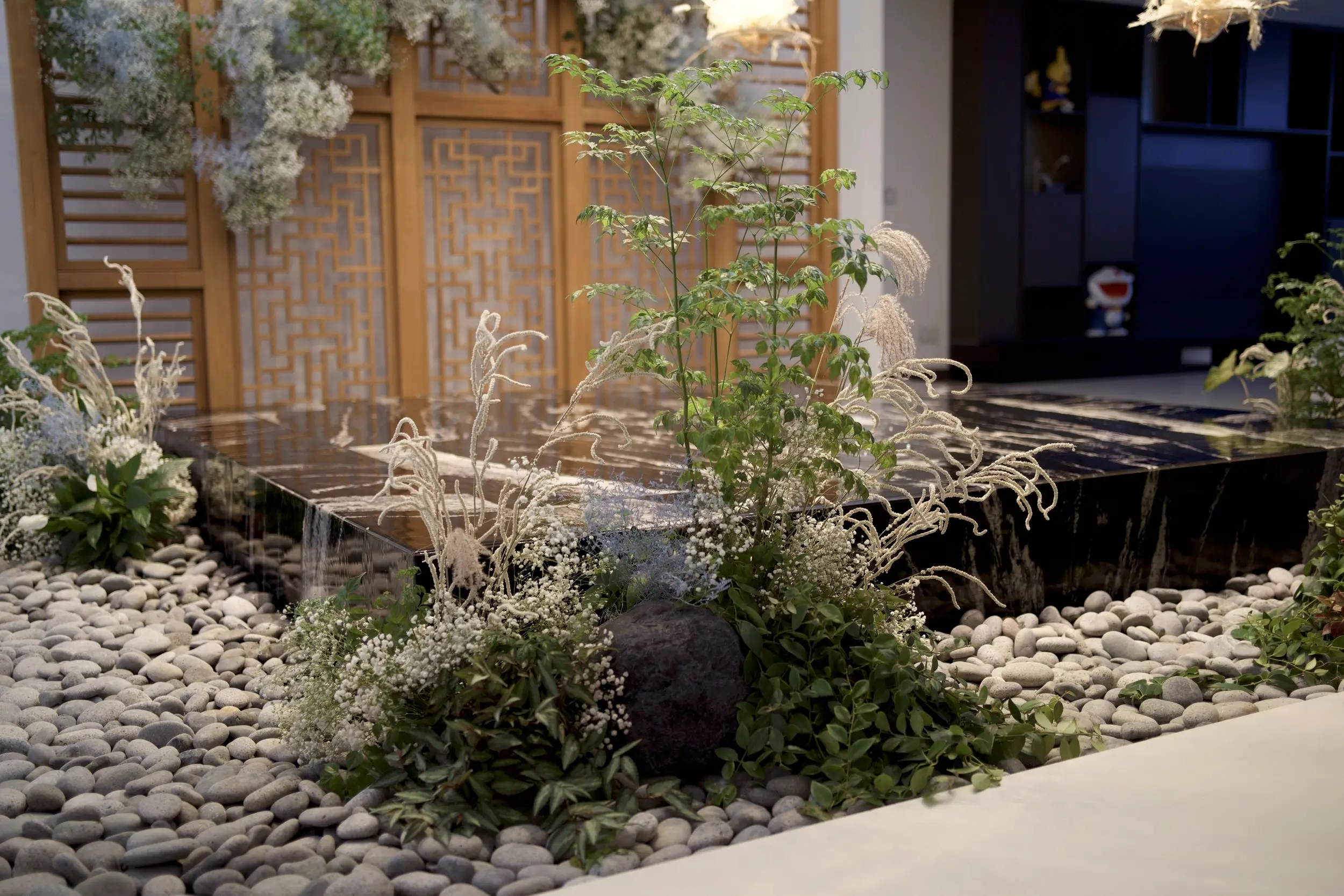 Islands of greenery painted with splashes of white and blue to add an ethereal appeal.